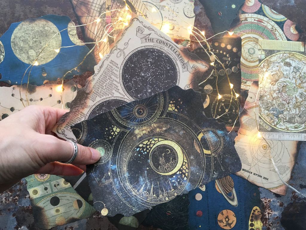planets themed scrapbook papers