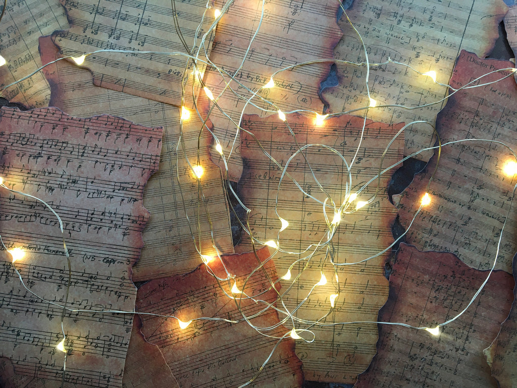 'Burnt vintage sheet music' style background papers