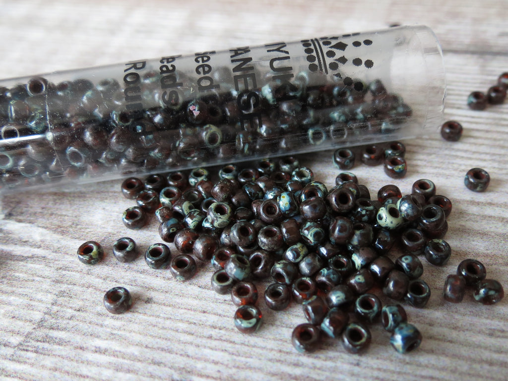 size 8/0 Miyuki seed beads in Picasso red brown