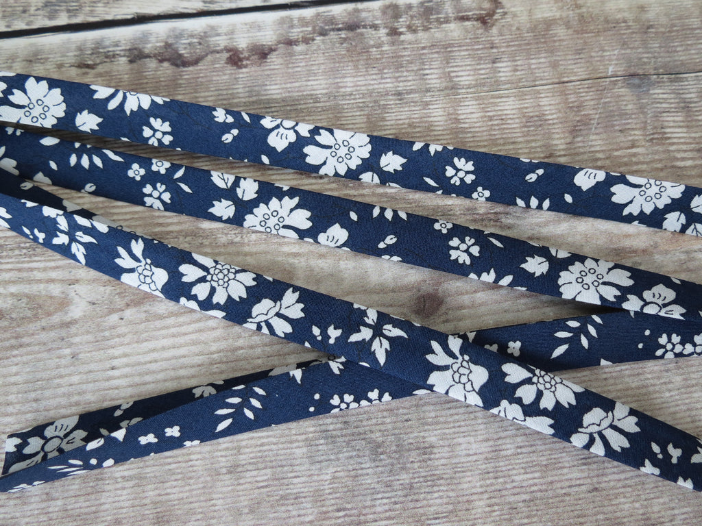 Navy blue and white Liberty bias binding with floral pattern for sewing and crafting
