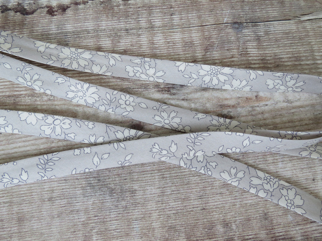 Pastel grey and white floral bias tape made with Liberty cotton fabric