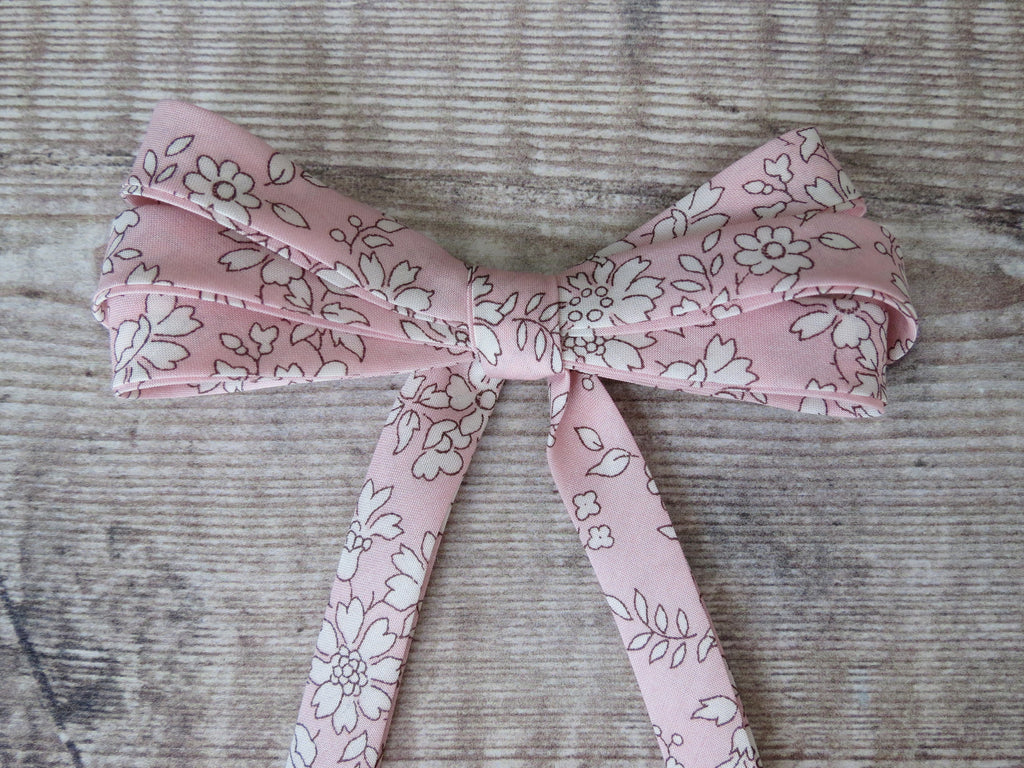 Pale pink floral bias tape for sewing and quilting, 10mm wide double fold