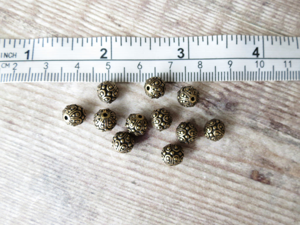 Brass oxide decorative Casbah spacer bead by TierraCast