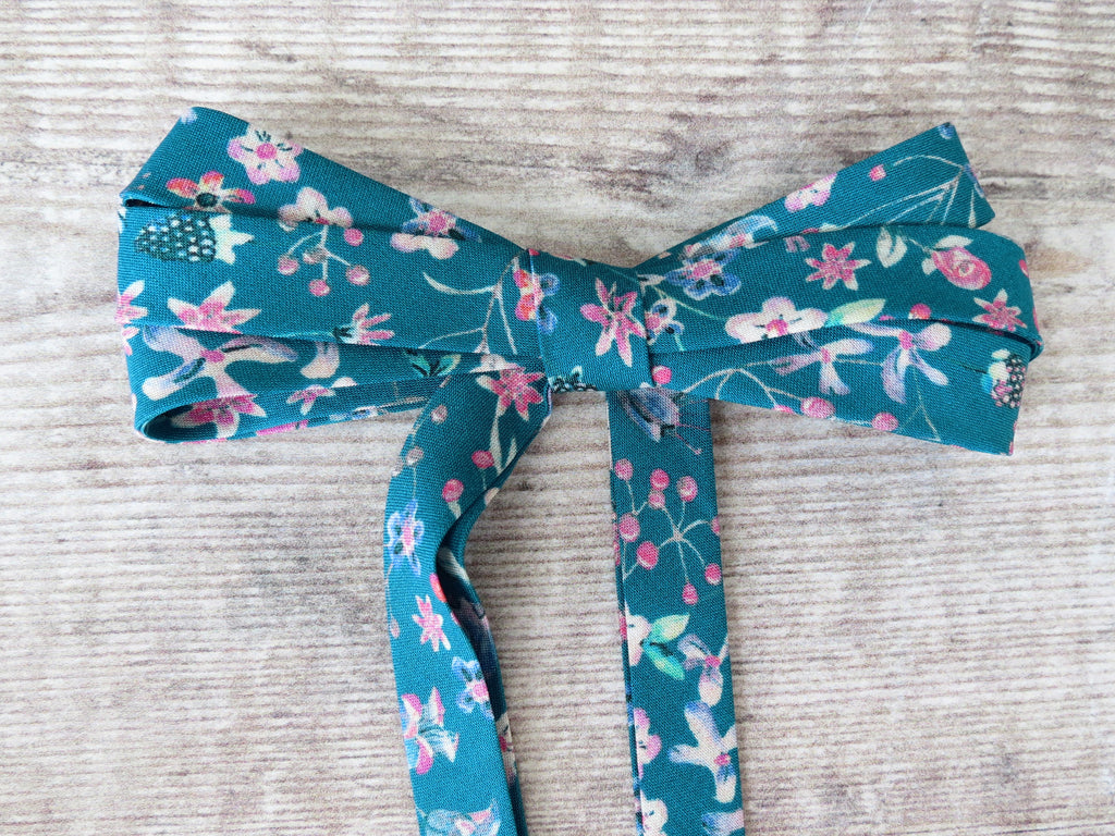 Liberty Donna Leigh D bias binding with a teal and pink floral pattern