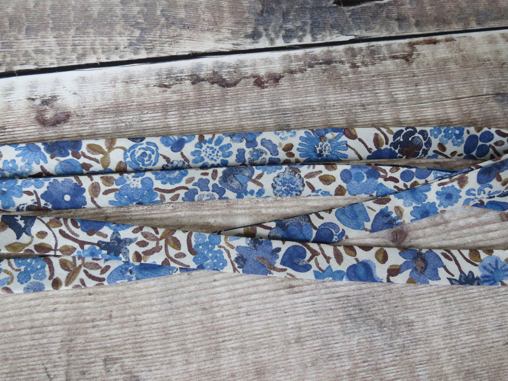 Blue and beige Liberty fabric bias tape for edging clothing and making bunting