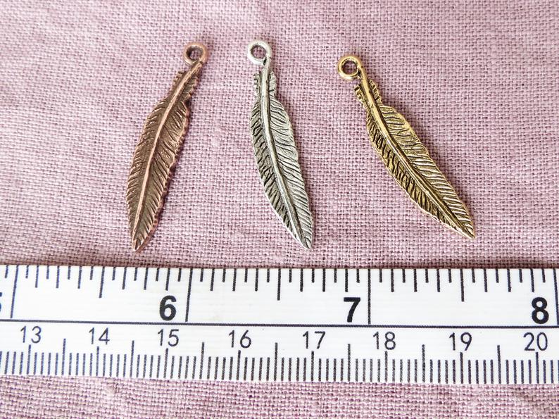Feather charms by Nunn Design