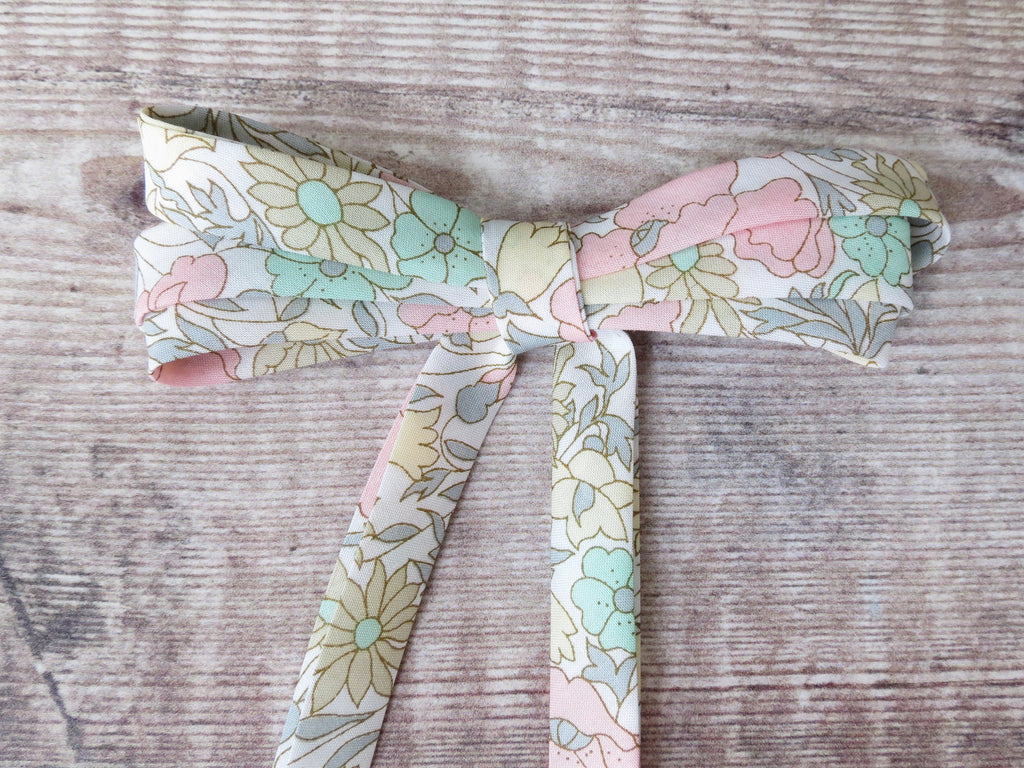Soft pastel coloured Liberty bias binding for customising baby clothing or blankets