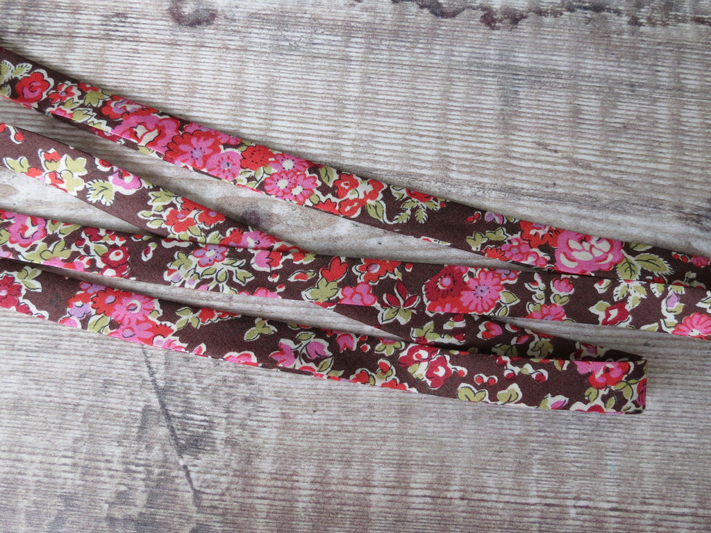 Bias tape made from Liberty Tana Lawn cotton Tatum G in pink and brown, 10mm wide