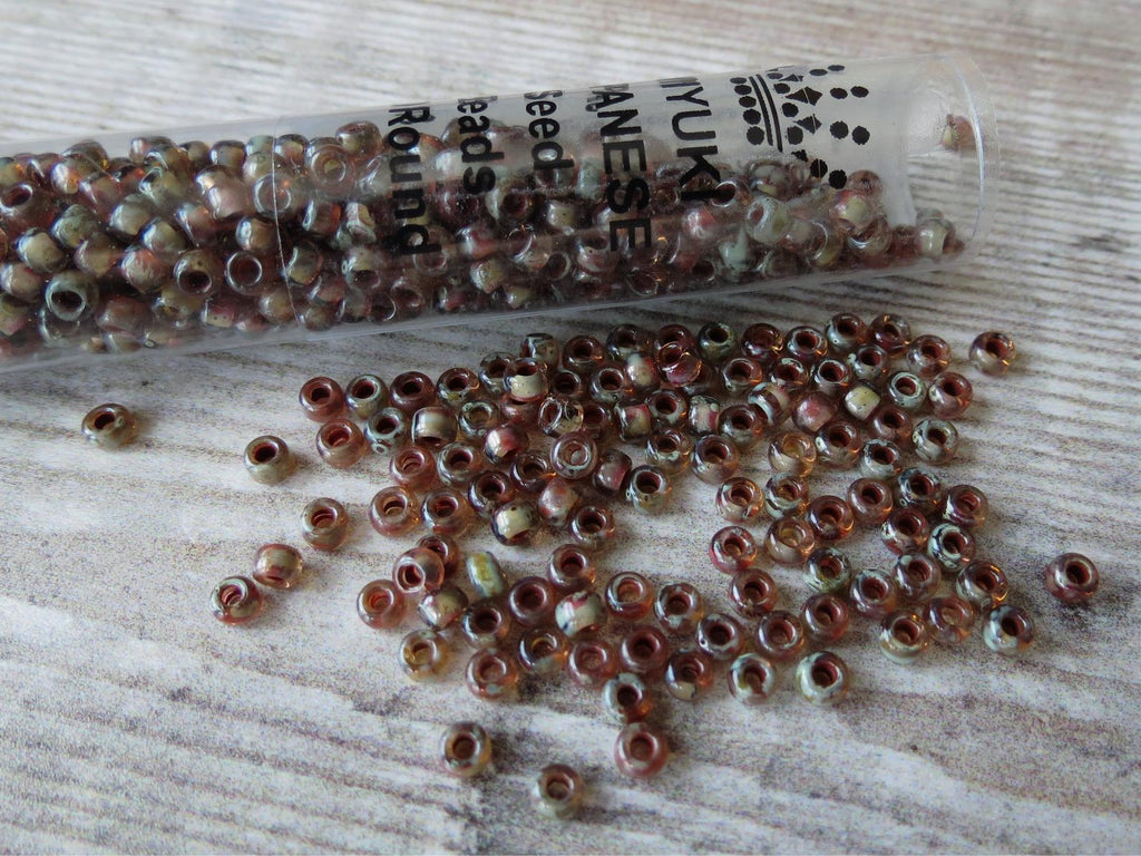 Size 8/0 Picasso Transparent Light Smoky Topaz 3mm seed beads, 22g tube