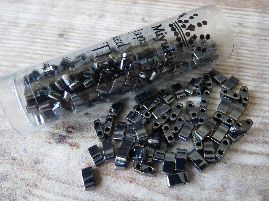 Tila half cut beads in gunmetal